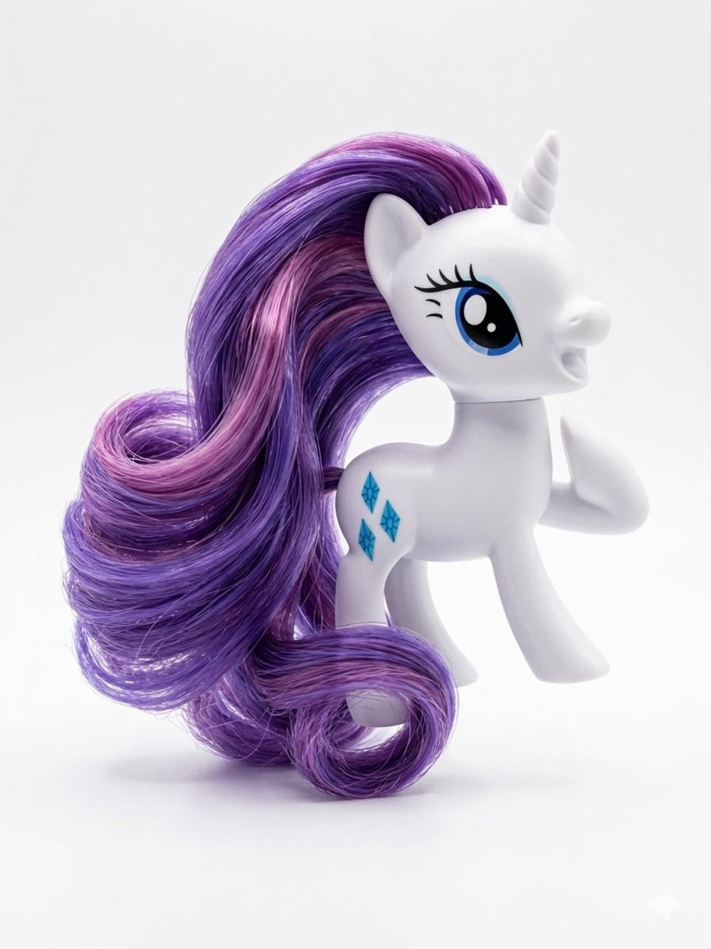 My Little Pony white unicorn with purple and pink mane